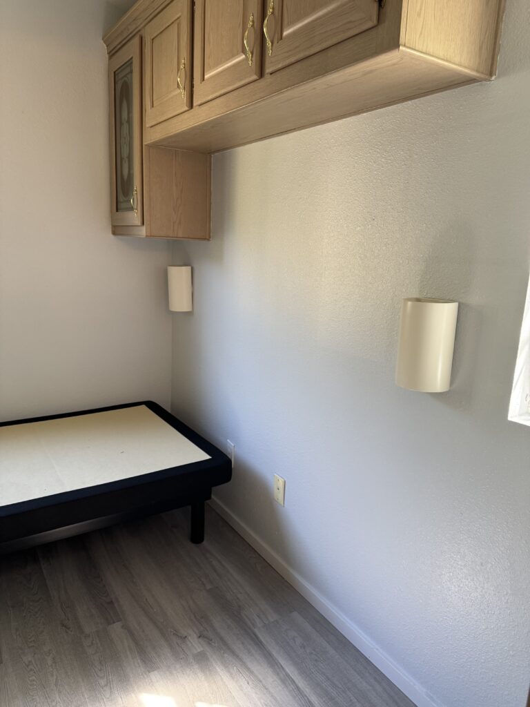 Bedroom wall - lamps surround the bed