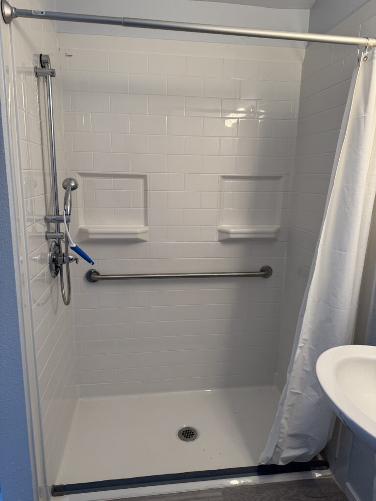 The roll-in/walk-in shower. This replaced the full-size tub that was originally installed